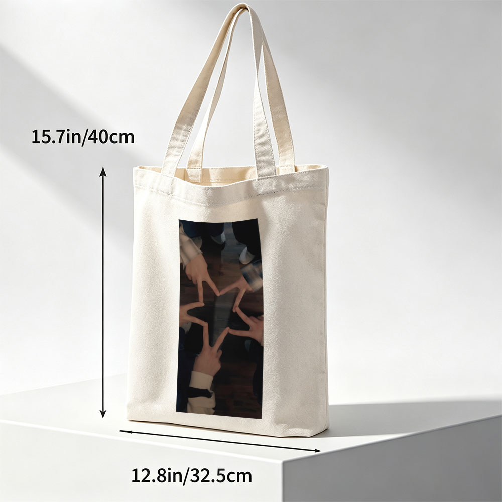 BTS Members Forming a Star with Their Hands on Wooden Floor - Canvas tote bags