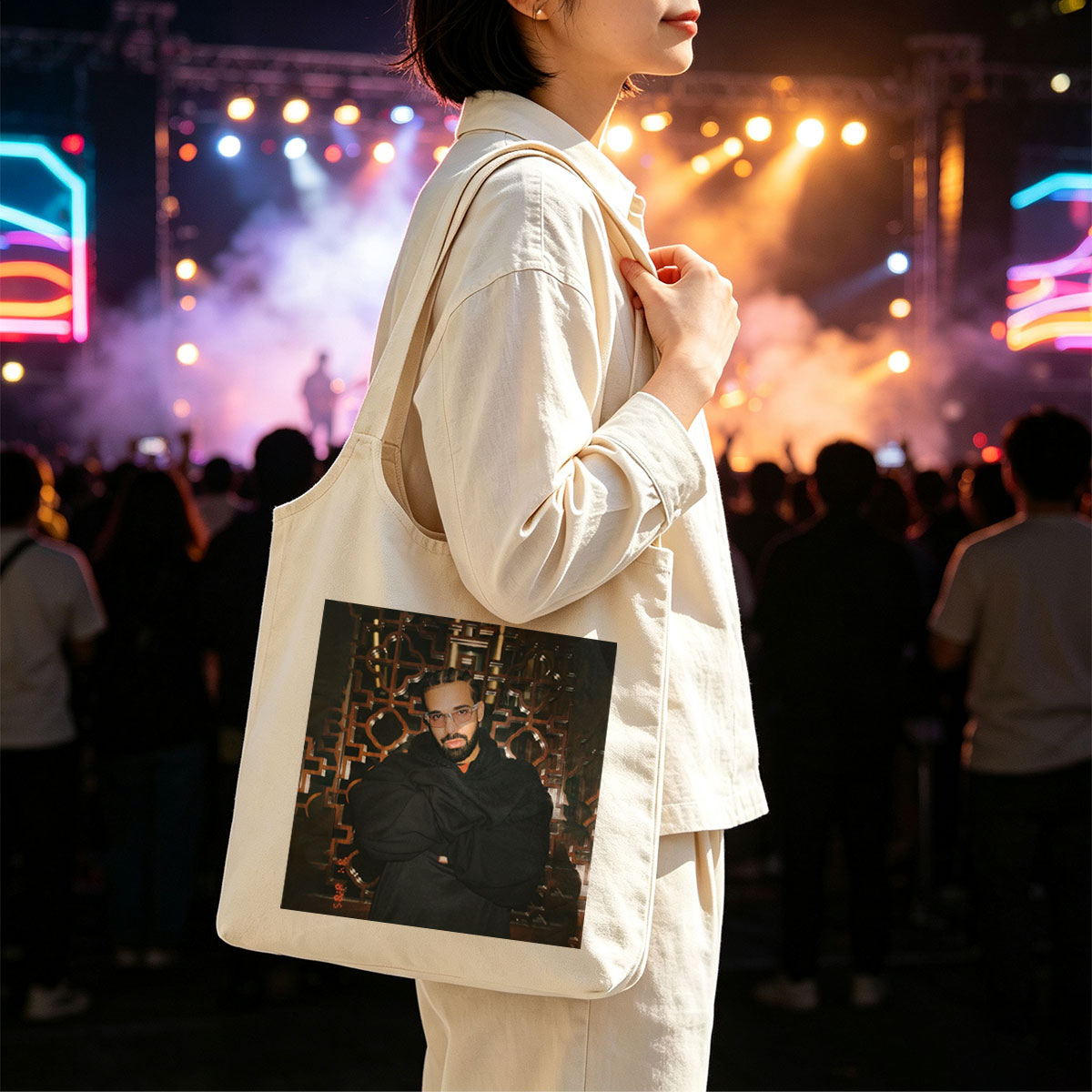 Drake in a Stylish Pose Against an Ornate Background Wearing Glasses and a Black Hoodie - Canvas shoulder bags/