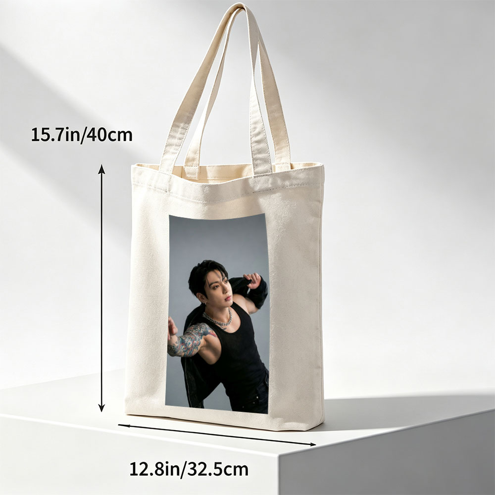 BTS Jungkook in a Powerful Pose with Tattooed Arm and Black Tank Top - Canvas tote bags