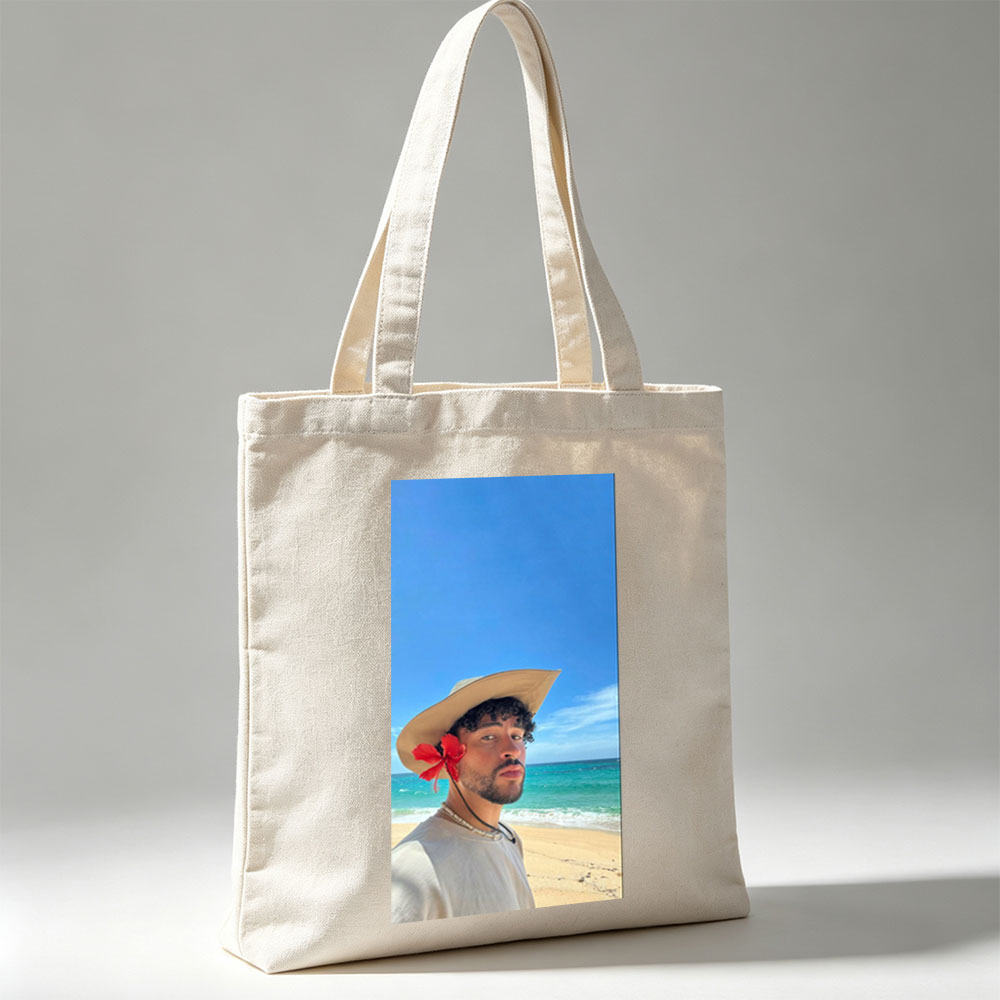 Bad Bunny on the Beach Wearing a Straw Hat with Red Flower and Beaded Necklace - Canvas tote bags