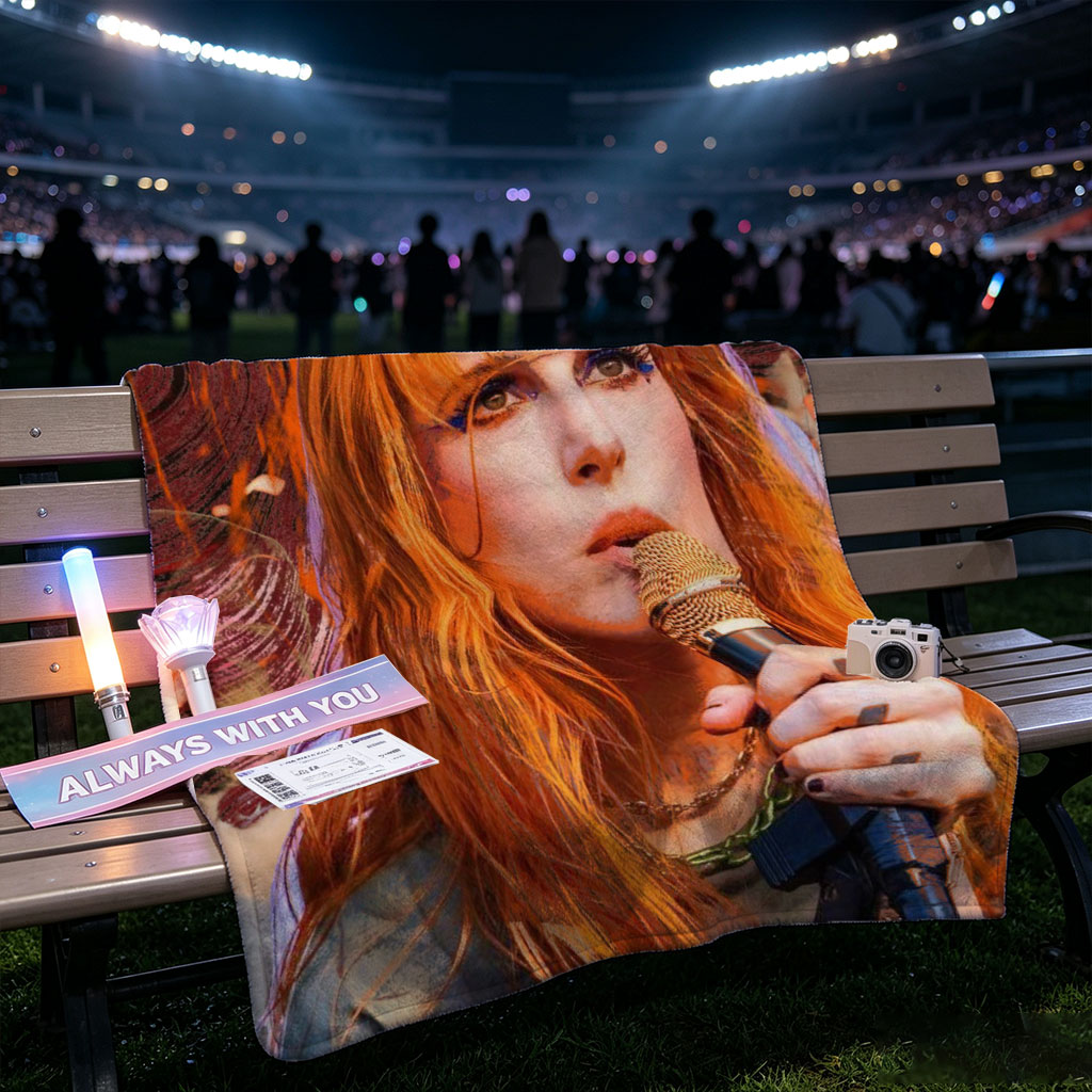 Paramore Live Performance - Hayley Williams Singing into Microphone with Vibrant Stage Background - Blankets