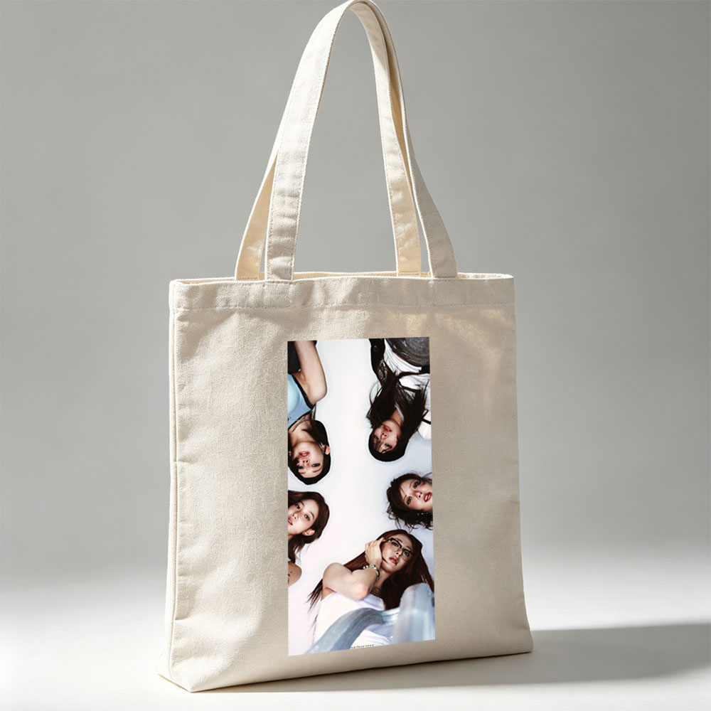 NewJeans Members Lying in a Circle on White Background with Expressive Poses and Fashionable Outfits - Canvas tote bags
