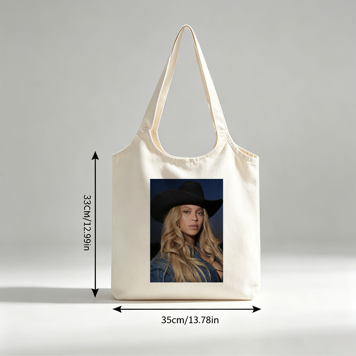 Beyonce in Cowboy Hat and Denim Jacket Against Dark Sky Background - Canvas shoulder bags/