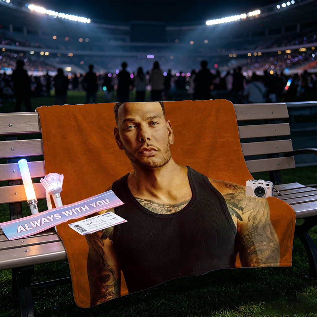 Liam Payne Standing in Black Tank Top with Visible Tattoos Against Orange Background - Blankets