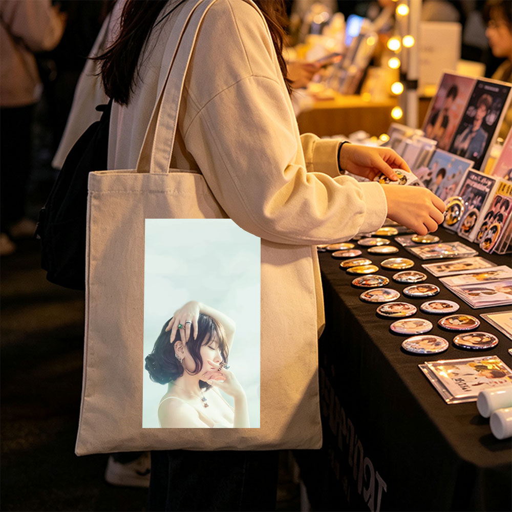 Nana Mizuki in a Serene Pose with Elegant Jewelry and Soft Lighting - Canvas tote bags