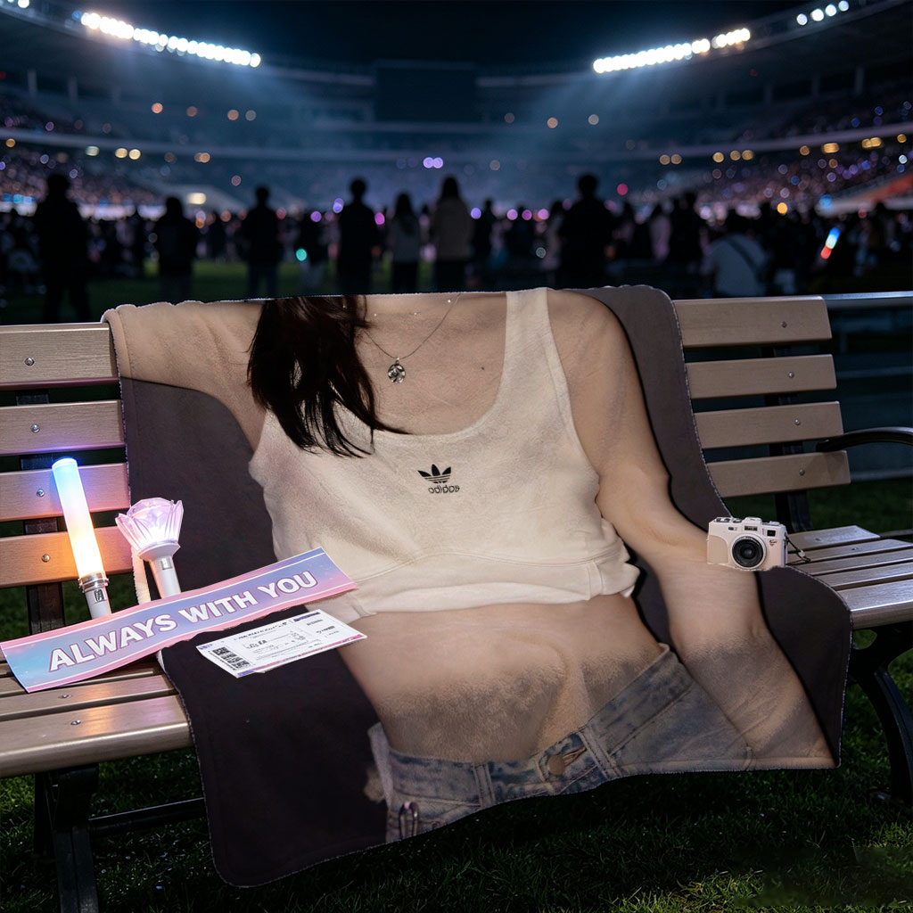 Korean Celebrity in Casual Outfit Wearing White Adidas Crop Top and High-Waisted Jeans Against Dark Background - Blankets