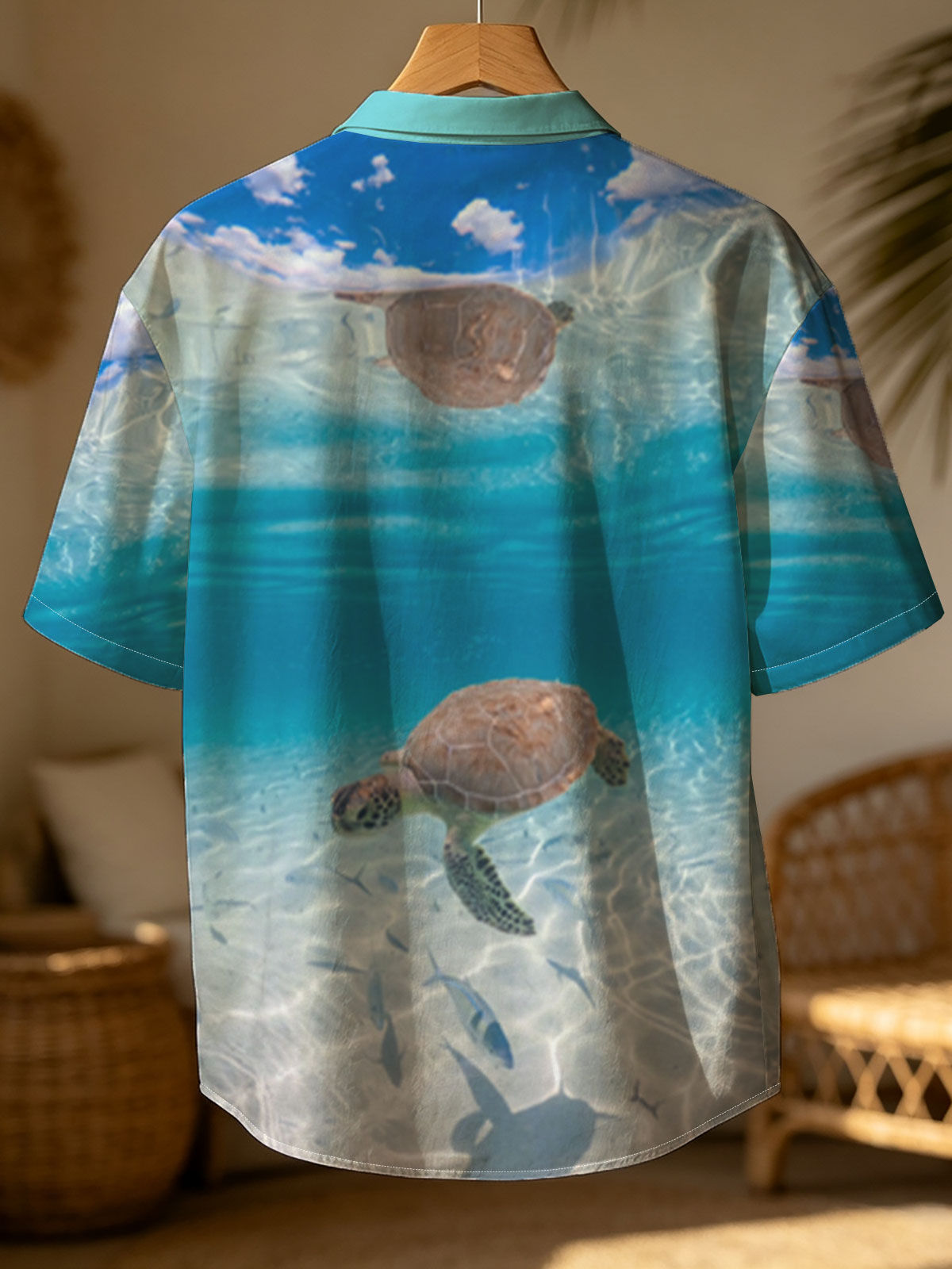 Sea turtle swims gracefully in clear blue water with fish below, sunlight filtering through the surface. -  Shirt