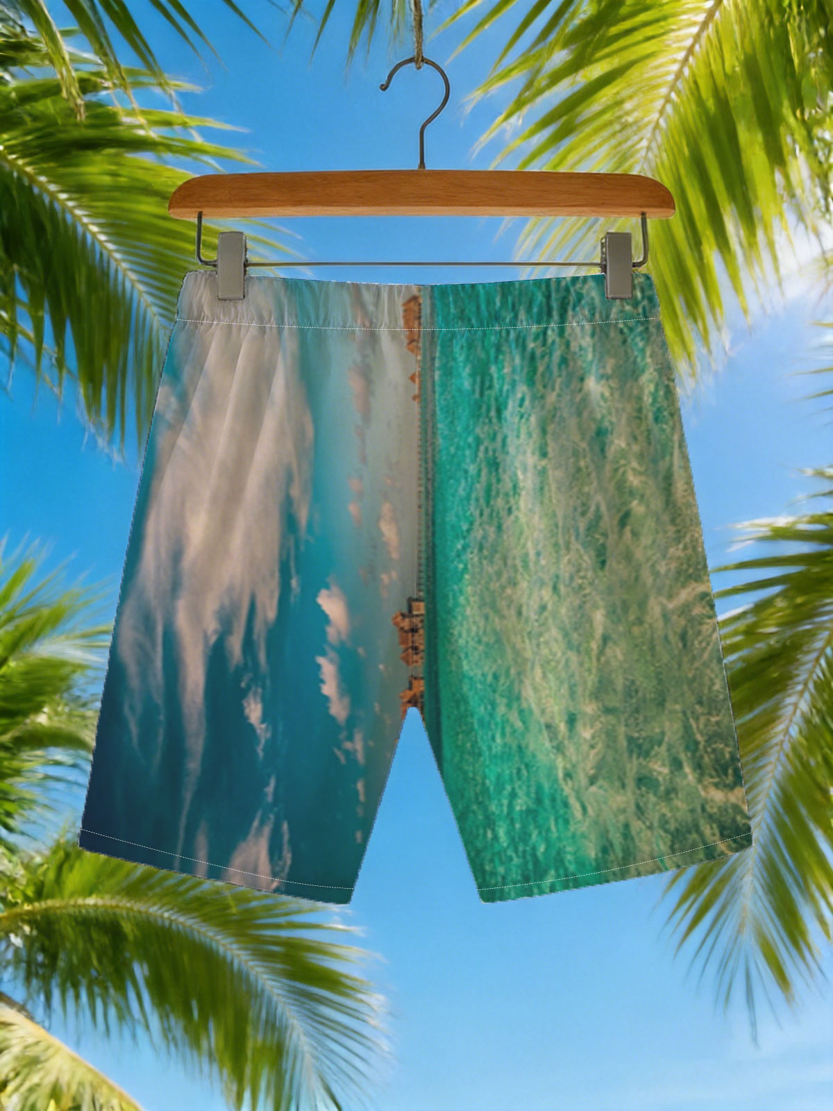 Overwater bungalows stretch into turquoise waters under a vibrant sky. -  Beach shorts