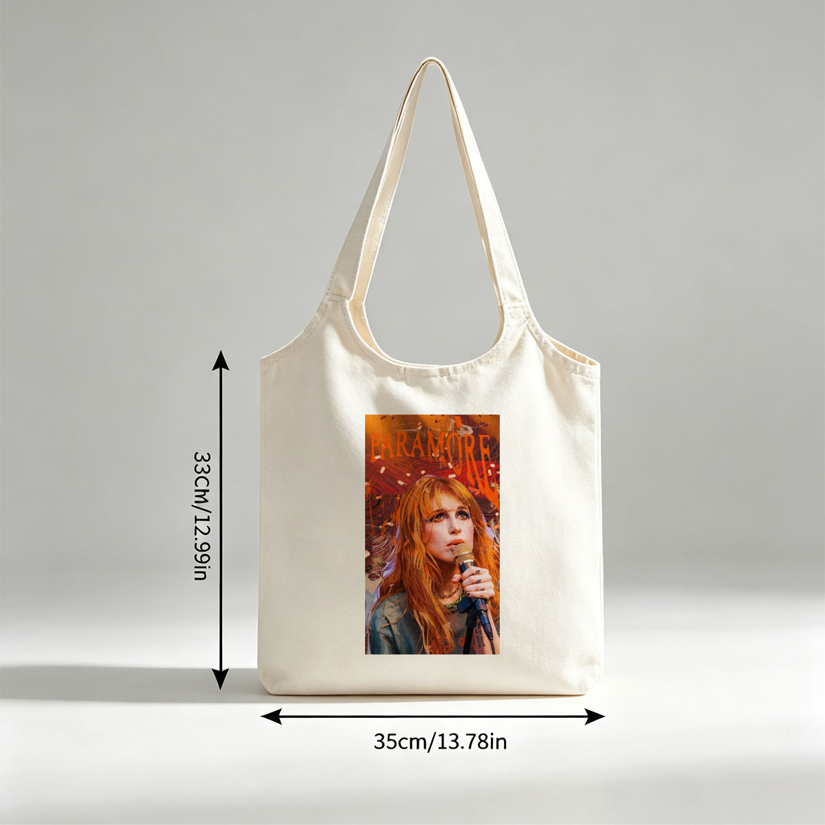 Paramore Live Performance - Hayley Williams Singing into Microphone with Vibrant Stage Background - Canvas shoulder bags/