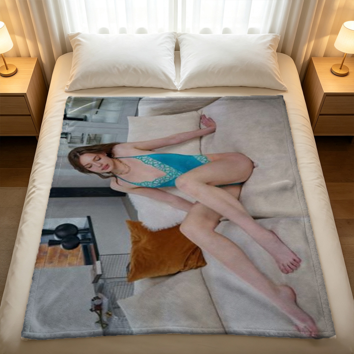 Young woman in white lingerie posing on orange sofa - Blanket