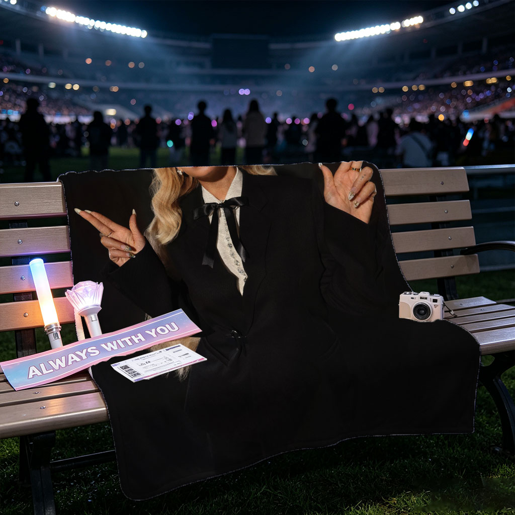 Beyonce in a Bold Black Suit and Hat Making Peace Signs Against a Dark Background - Blankets