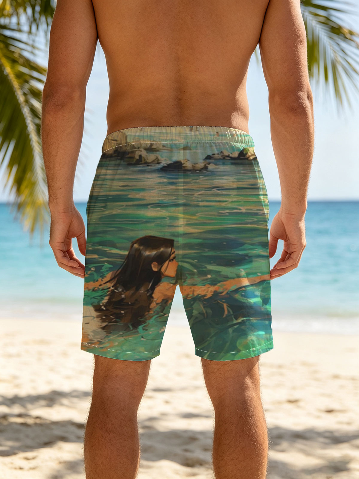 Woman swimming in clear blue water near rocky shore -  Beach shorts