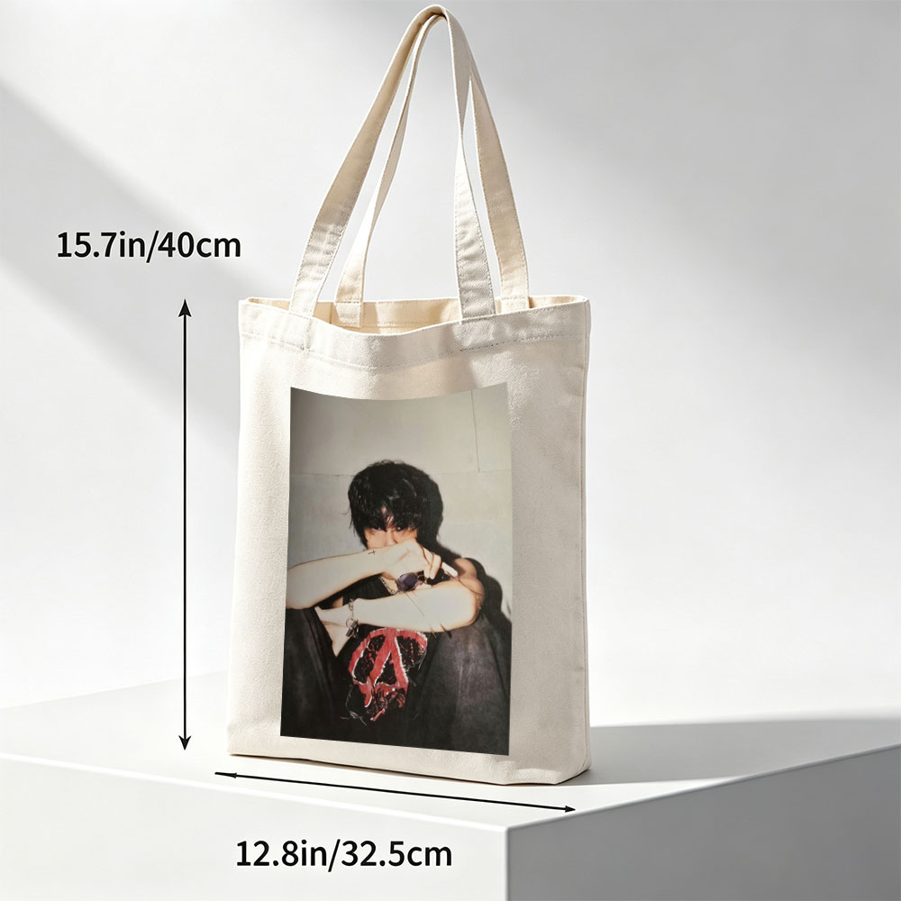 Hyunjin of Stray Kids in a Moody Pose with Sunglasses and Cross Tattoo, Wearing a Black T-Shirt with Red Peace Symbol Design - Canvas tote bags