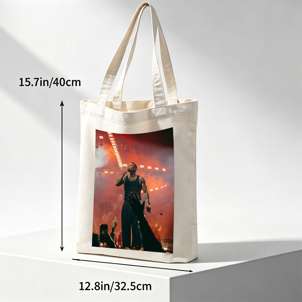 Tory Lanez on Stage Performing at a Concert with Intense Red Lighting and Crowd Engagement - Canvas tote bags