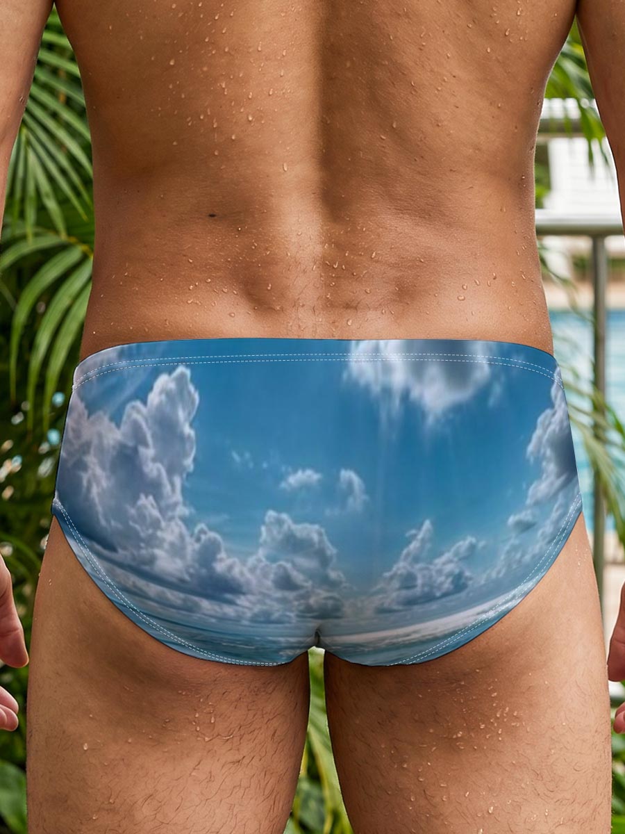 Sunlit Beach with Crystal Clear Waters and Fluffy Clouds -  Men's swim trunks