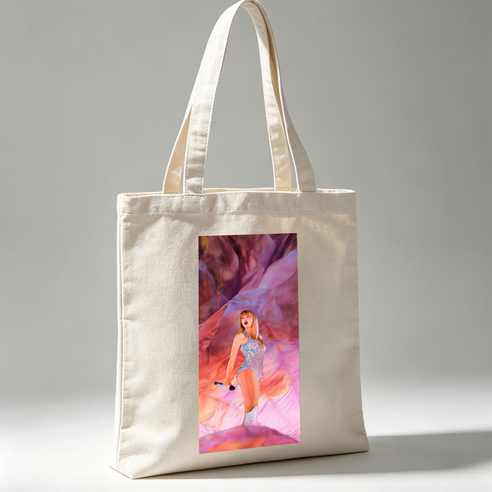 Taylor Swift Performance in a Sparkling Bodysuit on a Vibrant, Dreamlike Stage - Canvas tote bags