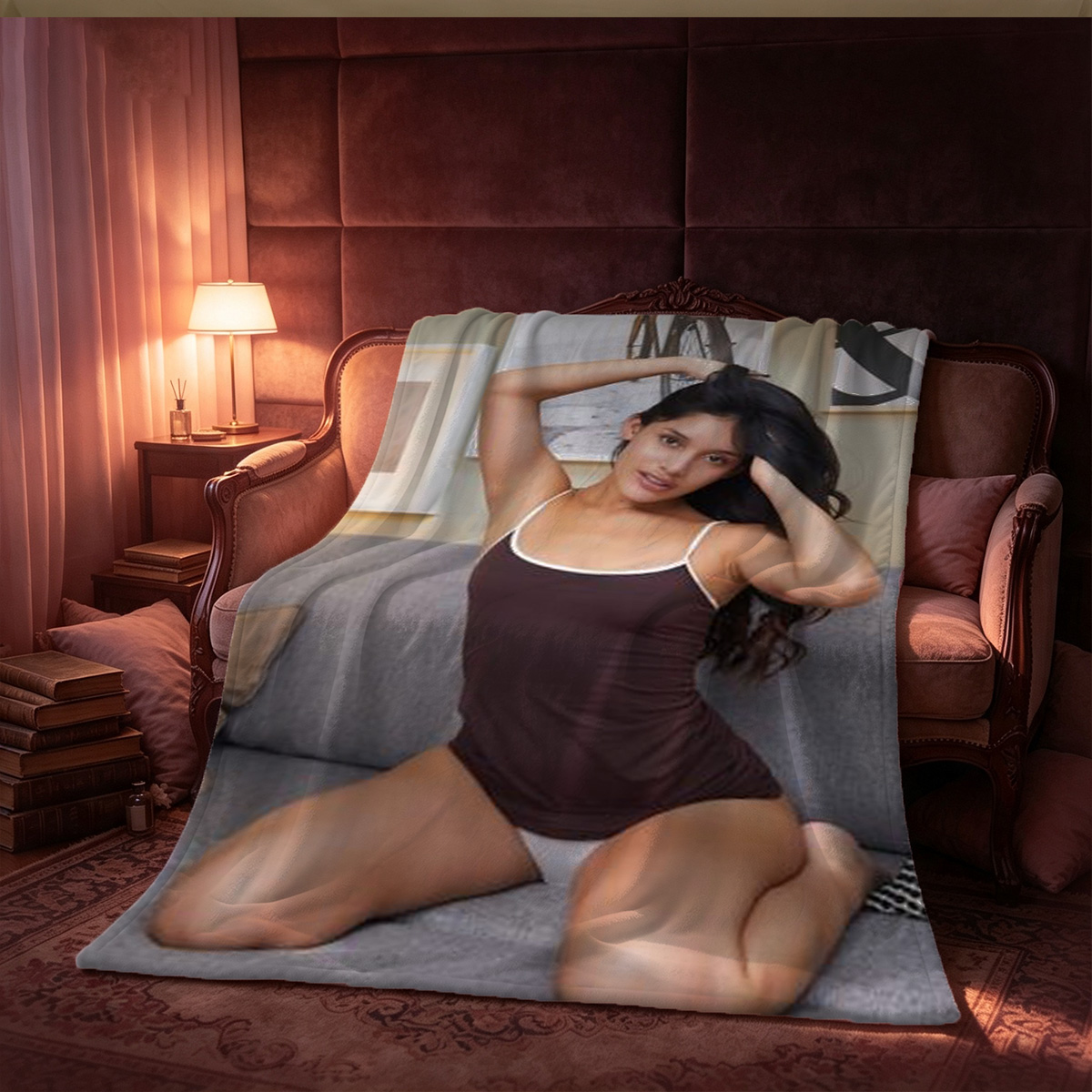 Redhead in black lingerie kneeling on bed smiling with arms raised. - Blanket