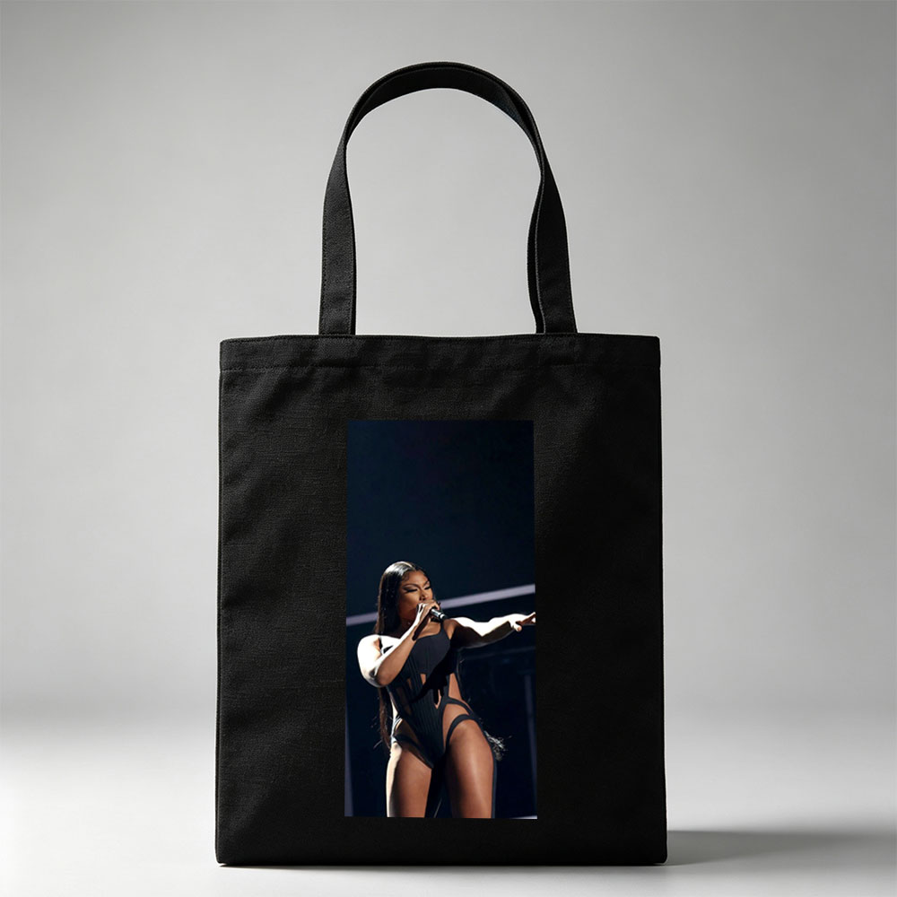Cardi B Performing on Stage in a Black Bodysuit Holding a Microphone - Canvas tote bags