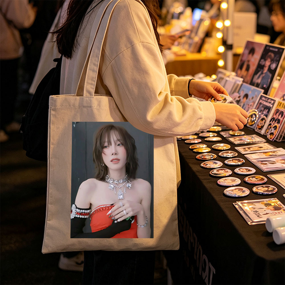 Taeyeon in a glamorous red outfit with sparkling jewelry and bold accessories - Canvas tote bags