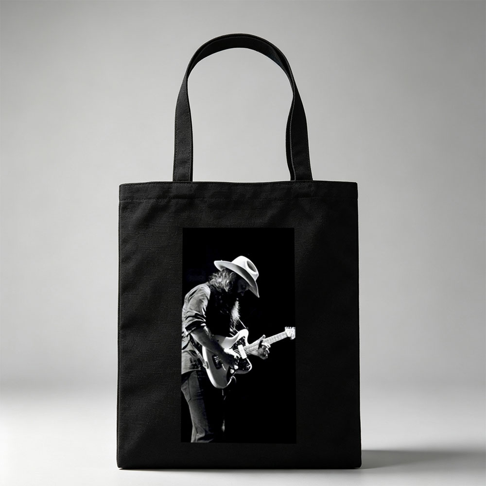 Stevie Ray Vaughan Playing Guitar on Stage in Black and White Photo - Canvas tote bags