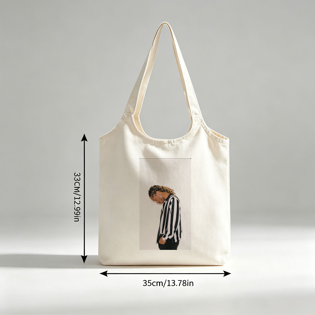 Lil Durk in a Striped Shirt with Braided Hair Against a White Background - Canvas shoulder bags/
