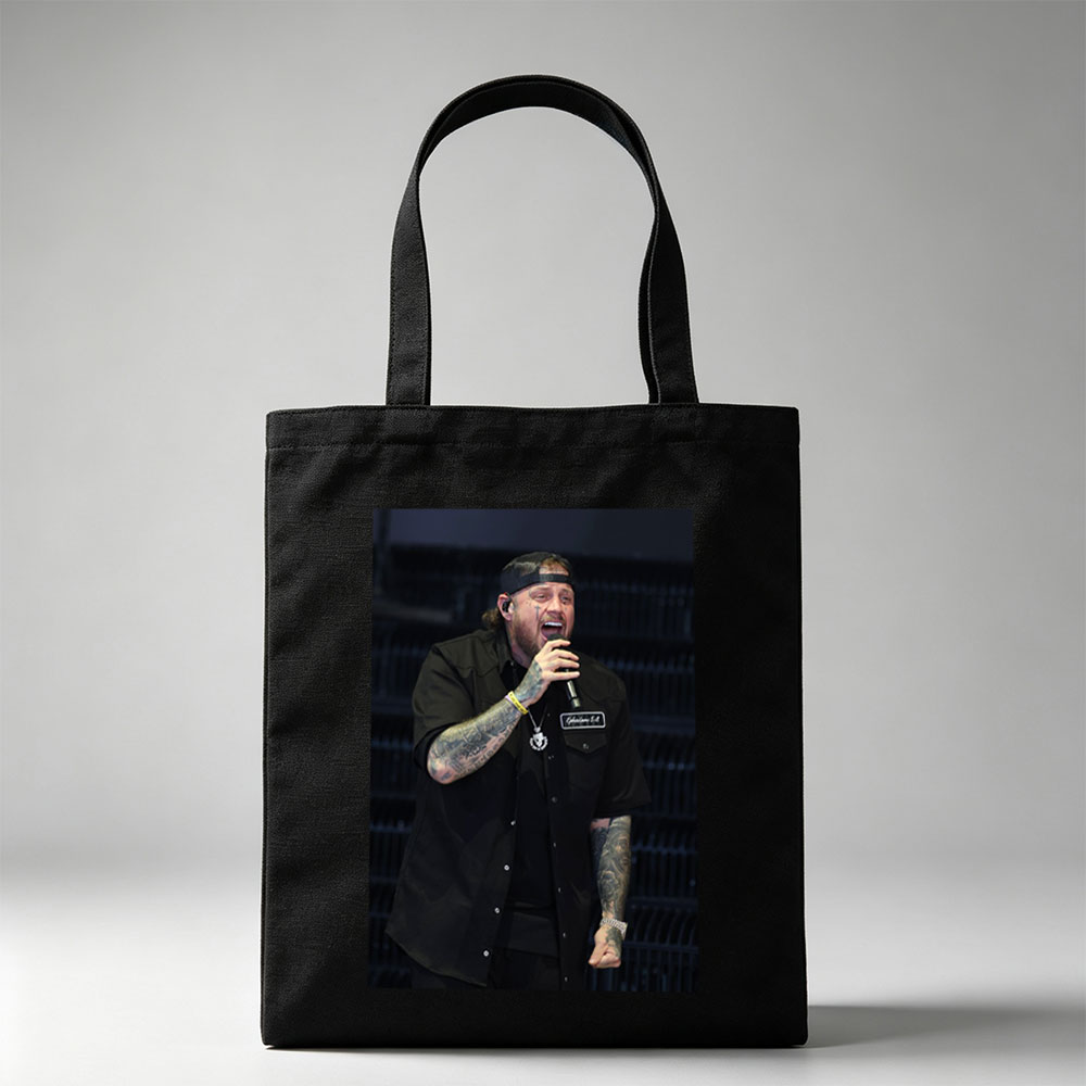 Cody Johnson Performing on Stage with Microphone and Tattooed Arms - Canvas tote bags