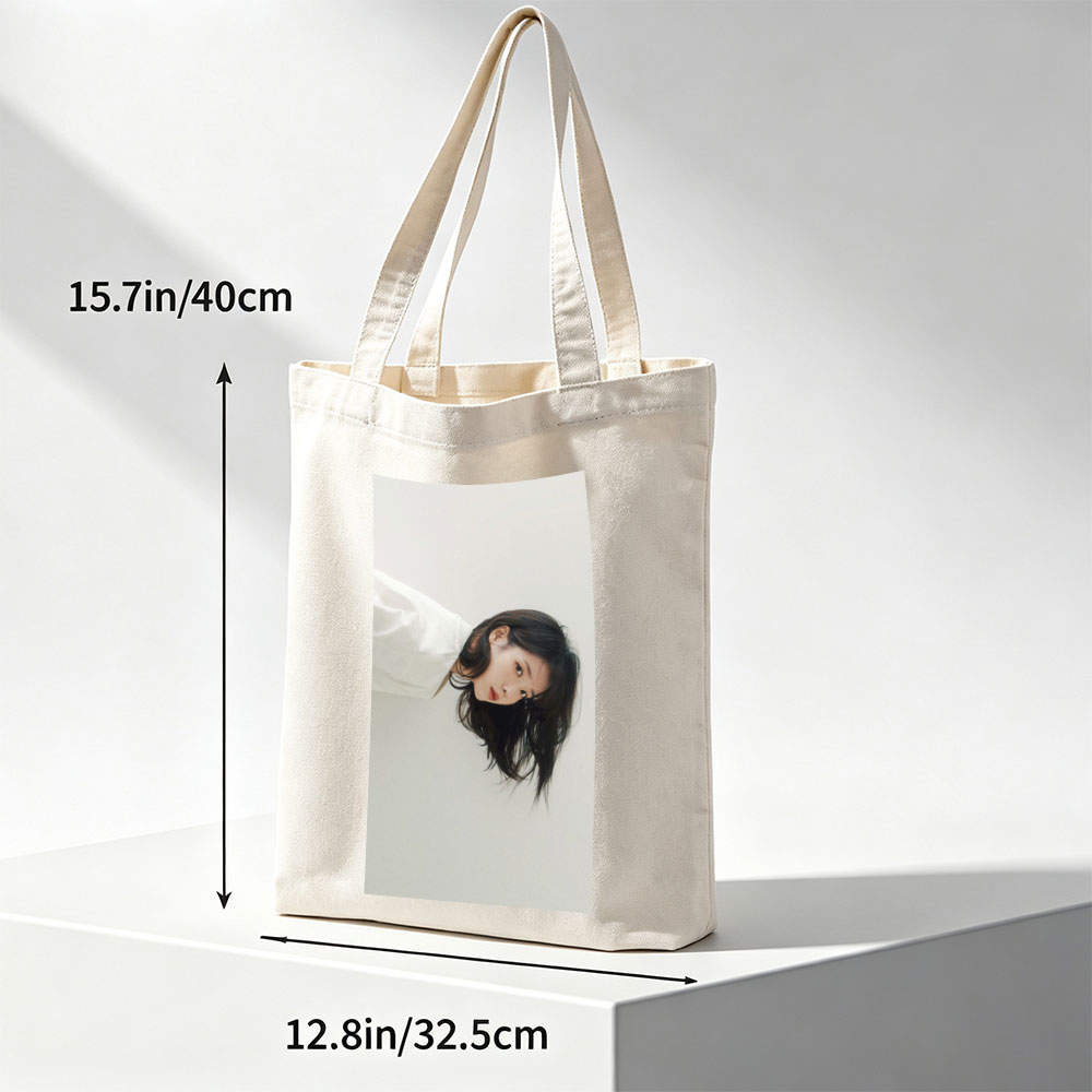 IU in a Minimalist Portrait with Soft Lighting and Neutral Background - Canvas tote bags