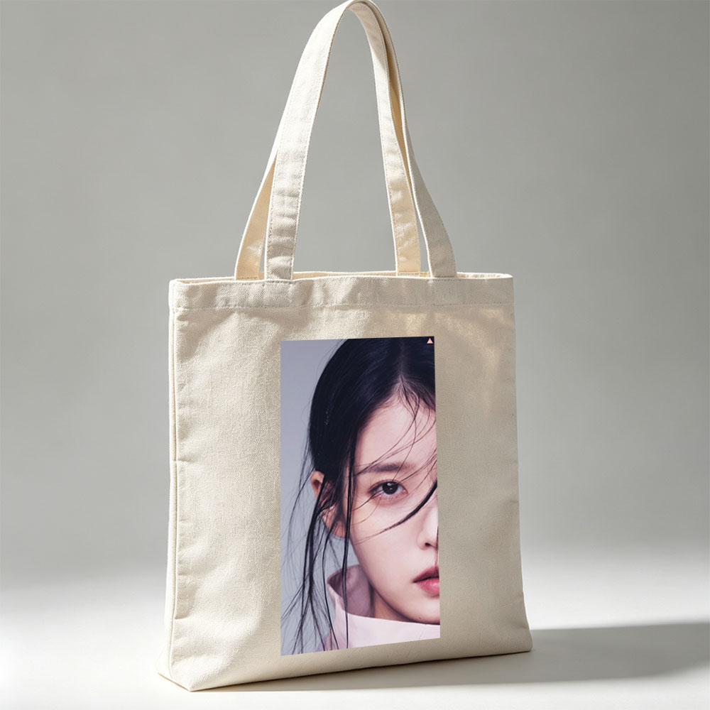 IU Close-Up Portrait with Soft Lighting and Gentle Expression - Canvas tote bags