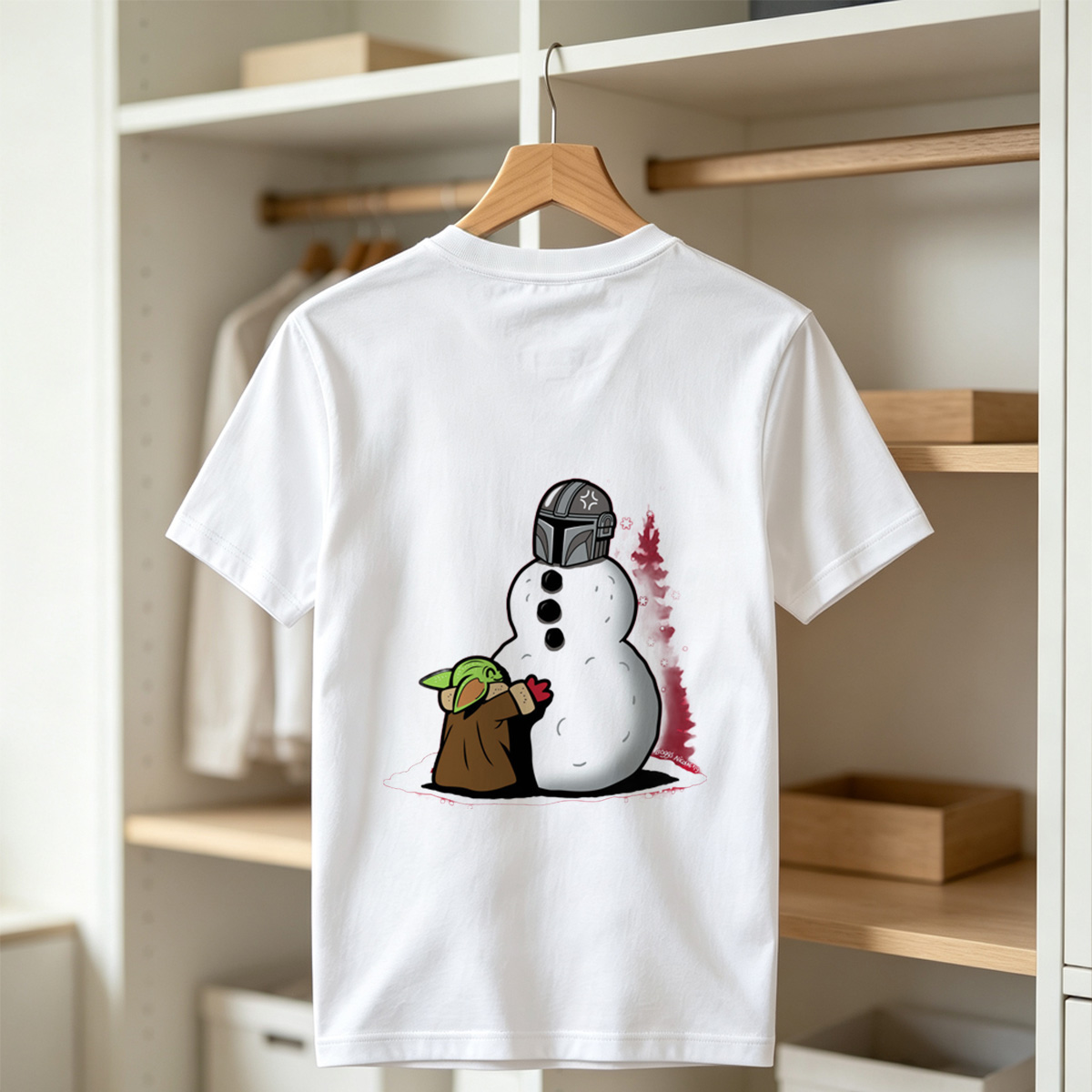Baby Yoda Builds Snowman with Mandalorian Helmet - Tee