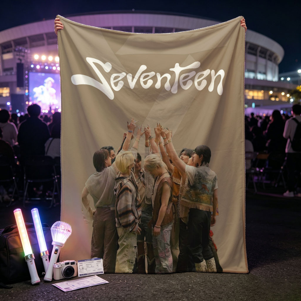 Seventeen Group Huddle Pose with Raised Hands in Stylish Outfits - Blankets