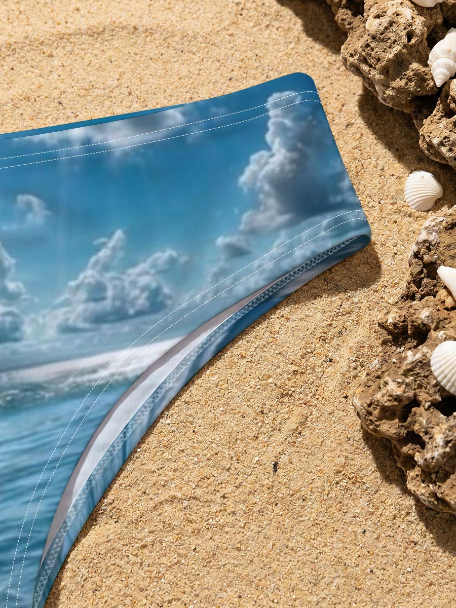 Sunlit Beach with Crystal Clear Waters and Fluffy Clouds -  Men's swim trunks
