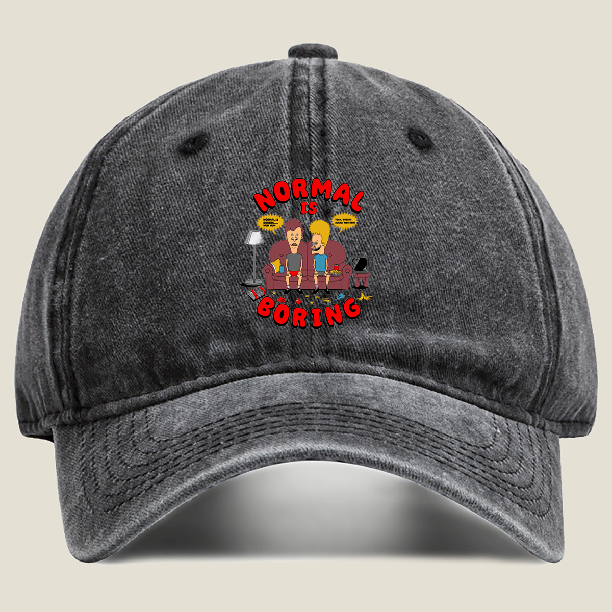Normal Is Boring: Two Cartoon Characters on Couch with Chaos Around - Washed Denim - Baseball Cap