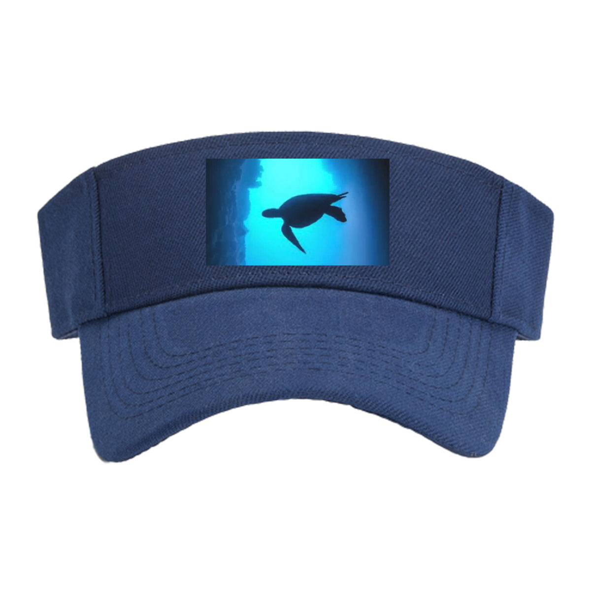 Sea turtle glides through a sunlit underwater cave. -  Visor cap