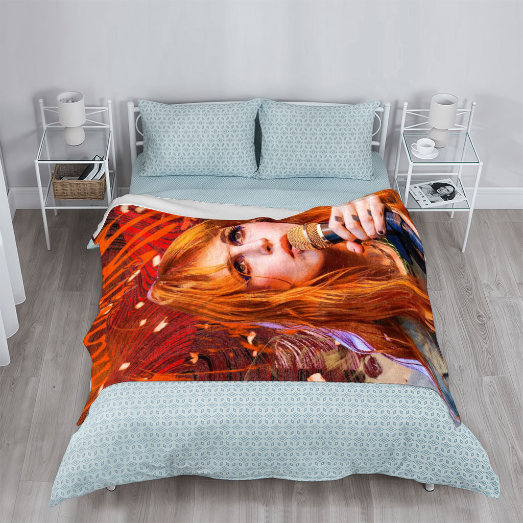 Paramore Live Performance - Hayley Williams Singing into Microphone with Vibrant Stage Background - Blankets