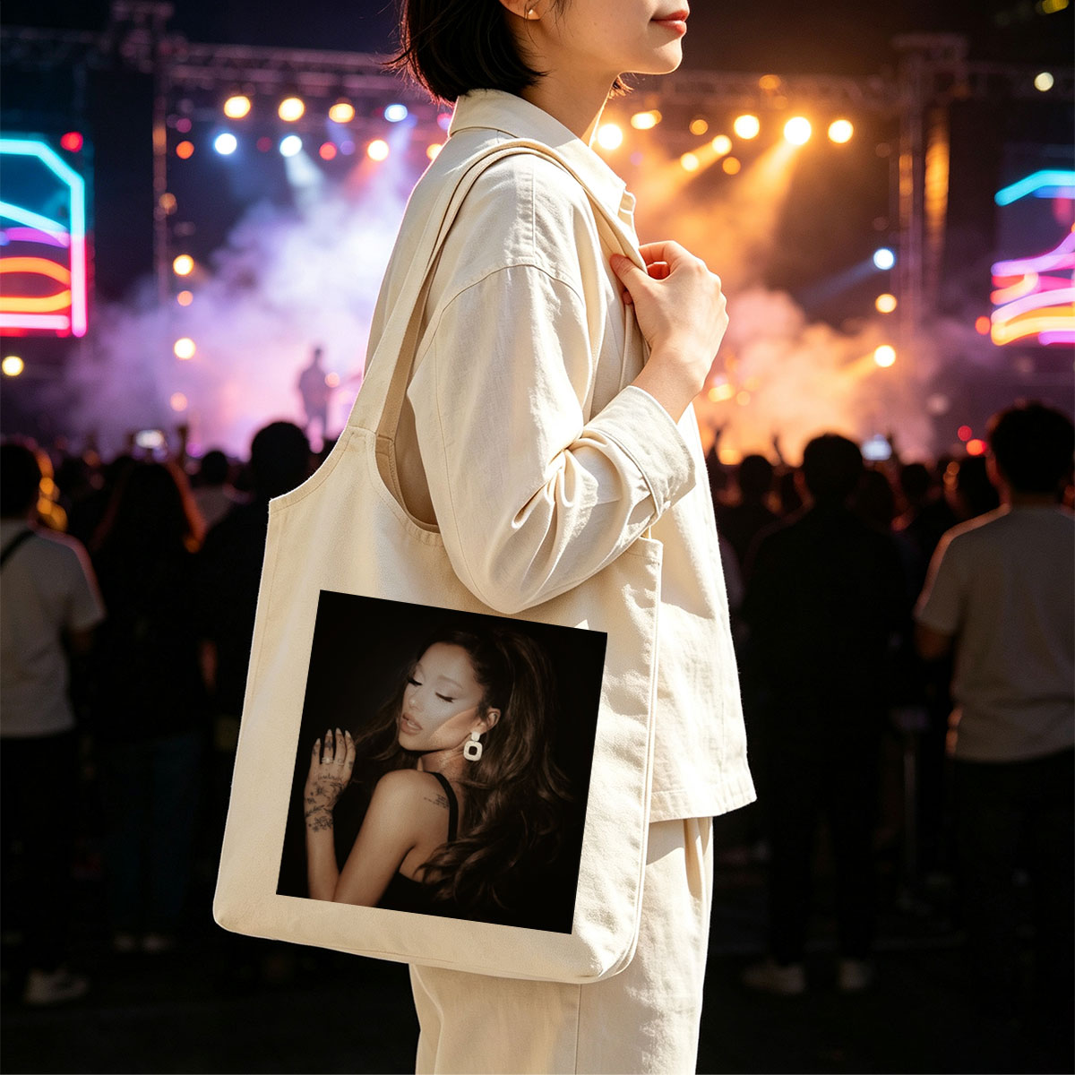 Ariana Grande in a Dramatic Pose with Long Hair and Tattoos on Dark Background - Canvas shoulder bags/