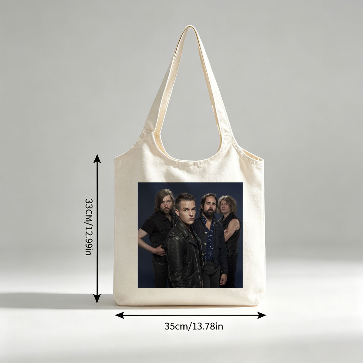 Imagine Dragons Band Members in Stylish Outfits Against Dark Background - Canvas shoulder bags/