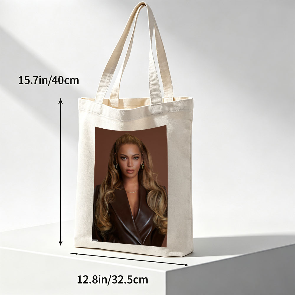 Beyonce in a Bold Brown Leather Look with Elegant Waves and Gold Jewelry - Canvas tote bags