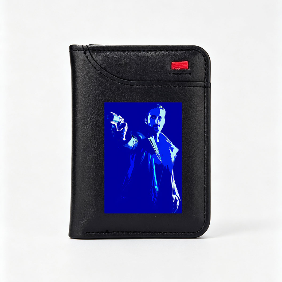 Ryan Gosling as Blade Runner in a blue-toned, stylized portrait holding a pistol. - Vertical Style Wallet