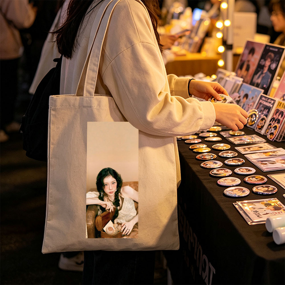 Kim Jisoo Relaxing on Couch with Vintage Accessories in Soft Lighting - Canvas tote bags