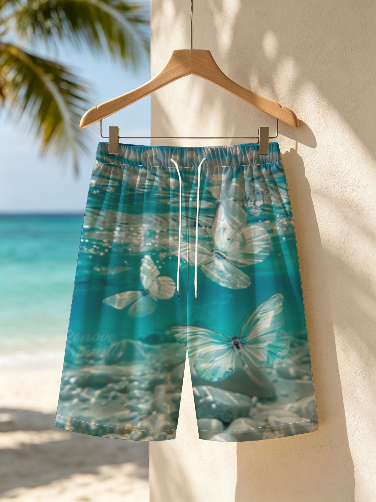 Butterflies floating underwater in clear blue water -  Beach shorts