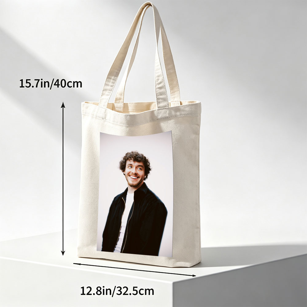 Matt Healy of The 1975 in a Candid Moment Wearing a Black Jacket and White Shirt Against a Plain Background - Canvas tote bags
