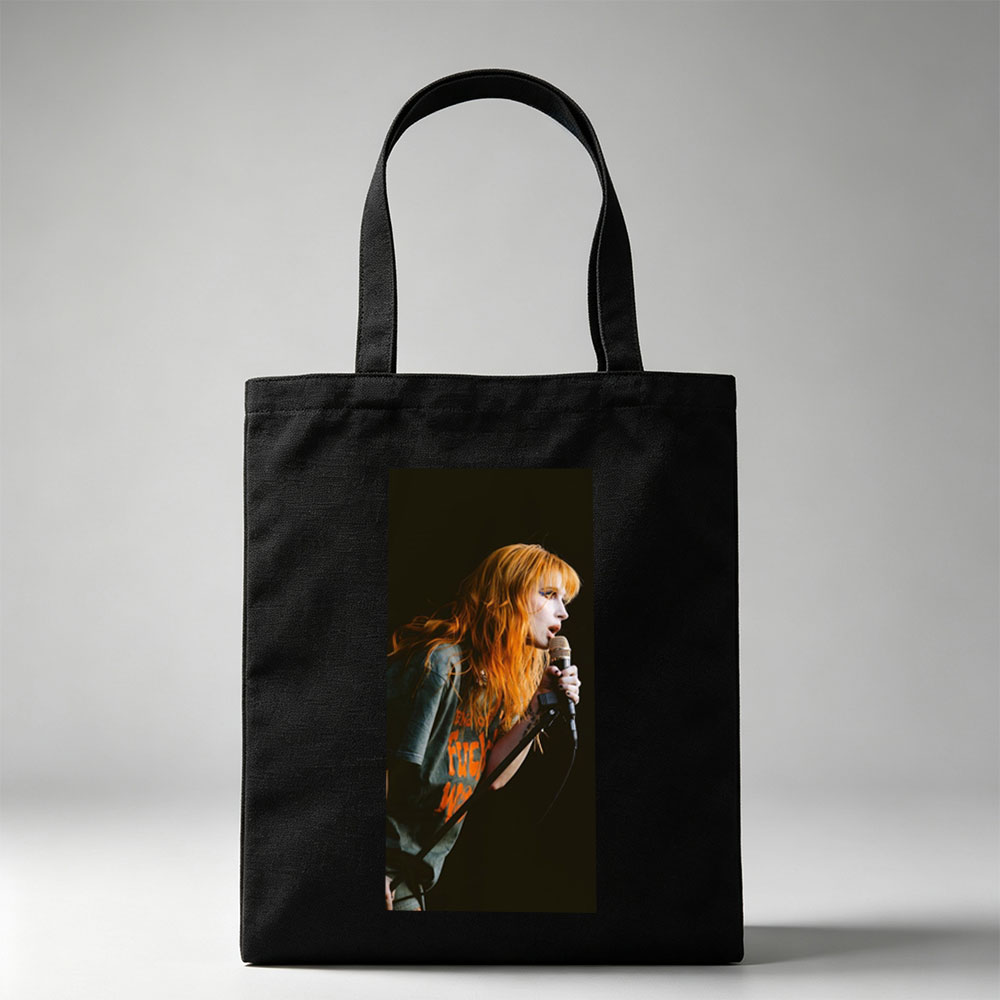 Paramore's Hayley Williams Performing on Stage with Microphone in Hand - Canvas tote bags