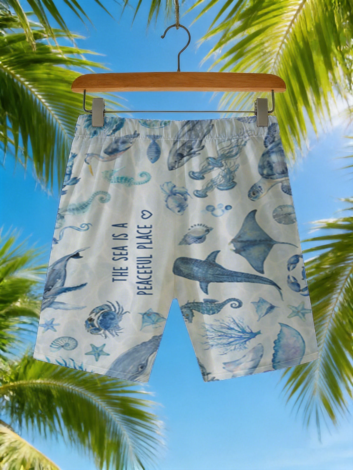 Underwater Serenity: Marine Life in Blue Hues -  Beach shorts