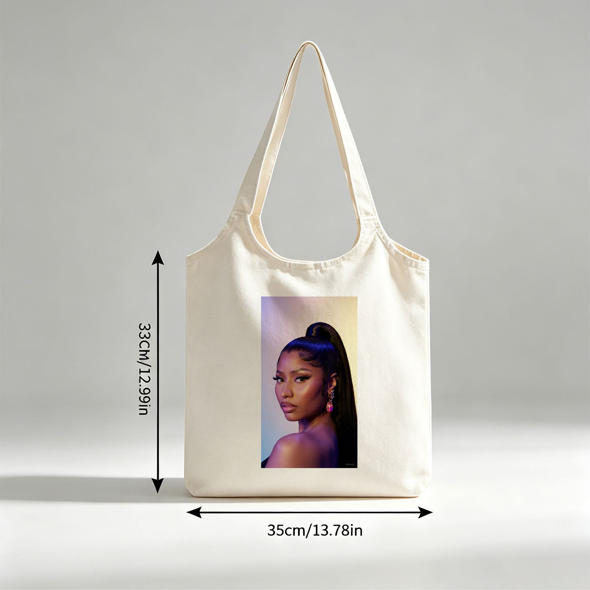 Nicki Minaj in a Stunning Portrait with Bold Makeup and High Ponytail Under Purple Lighting - Canvas shoulder bags/