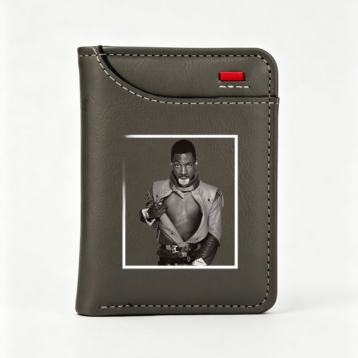 Eddie Murphy in a bold, edgy leather outfit with a dramatic pose - Vertical Style Wallet