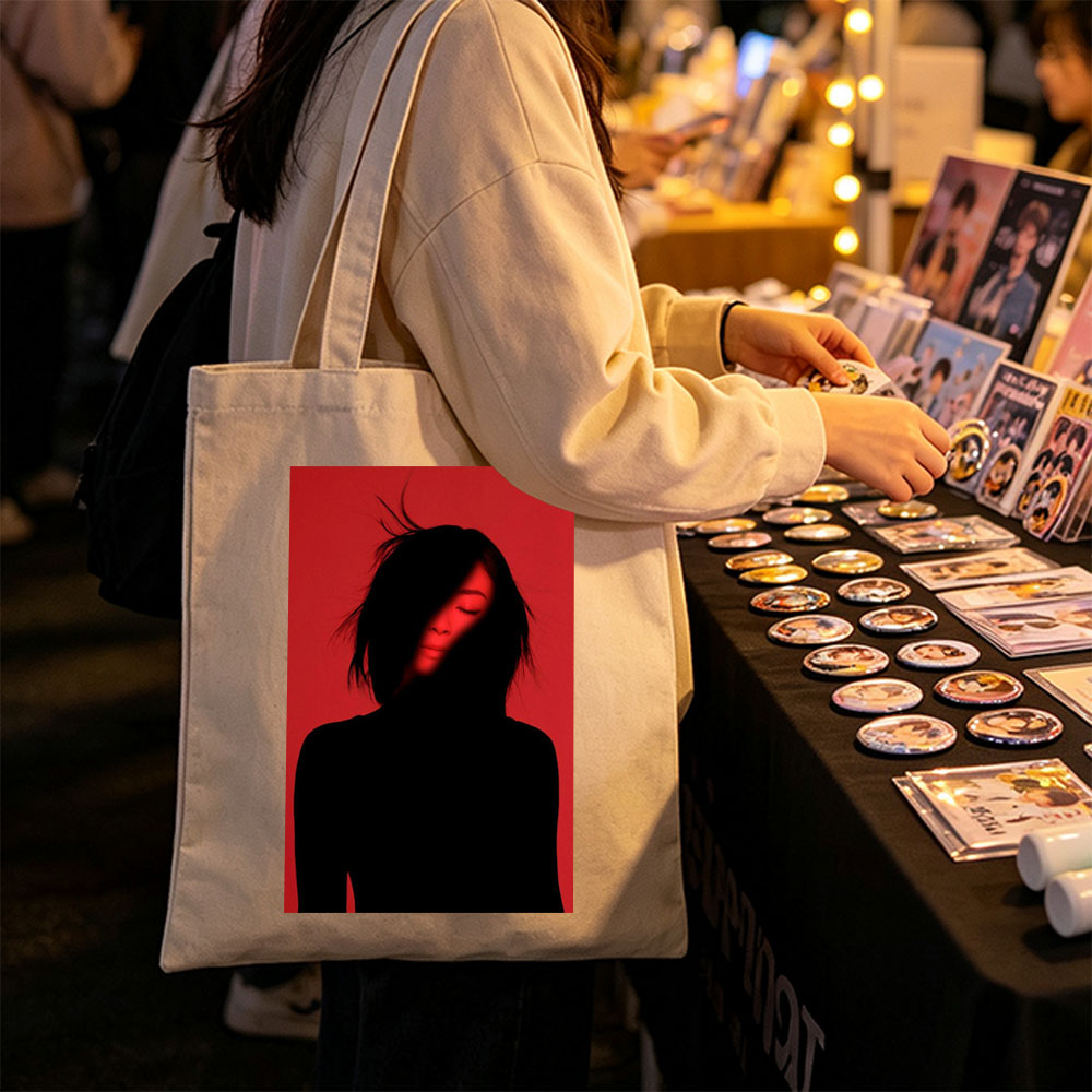 Billie Eilish in a Dramatic Red-Lit Portrait with Silhouetted Features - Canvas tote bags