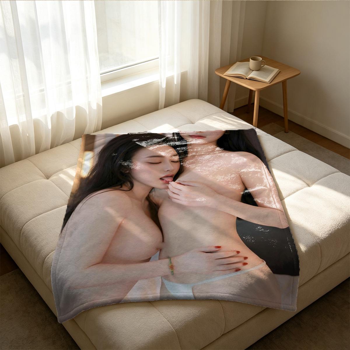 Nude woman with blue eyes lying on grey couch - Blanket