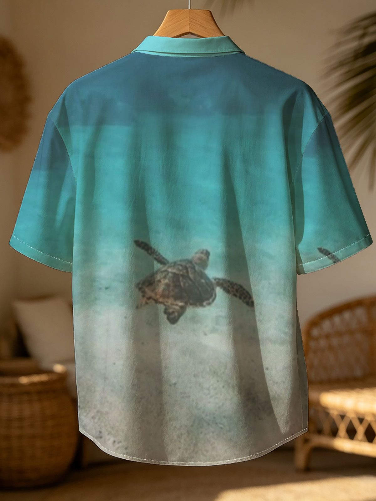 Sea turtle swimming in clear blue water over sandy ocean floor -  Shirt