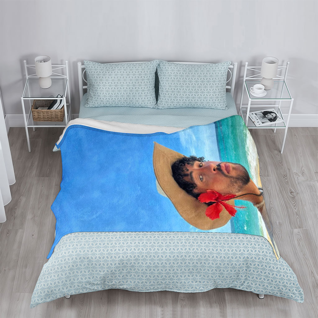 Bad Bunny on the Beach Wearing a Straw Hat with Red Flower and Beaded Necklace - Blankets