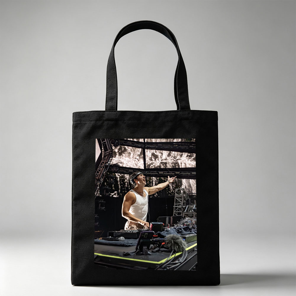 Martin Garrix Live Performance on Stage with DJ Equipment and Energetic Gesture - Canvas tote bags